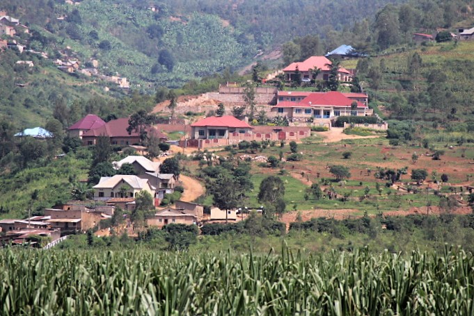 Houses on a hill in Rwanda organized from nicest on top to poorest on bottom.
